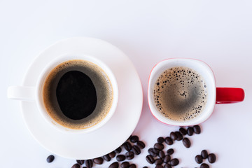 Top view of hot coffee cup and foam in white and red cup with beans isolated on white background and copy space.Coffee menu in the coffee shop or restaurant.