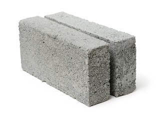 Gray cement solid brick isolated on a white background 