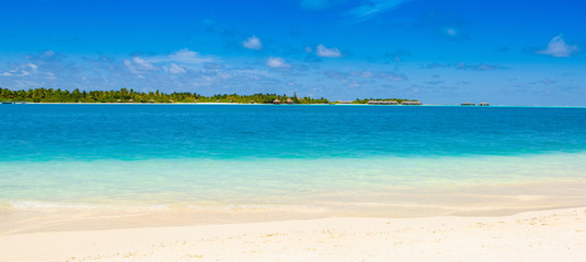 Beautiful panoramic landscape of the sandy beach in tropical island