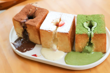 bread with chocolate powder ,icing and green tea powder