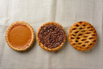Fototapety  Overhead still life of fresh baked holiday pies