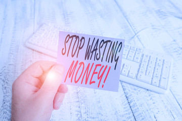Text sign showing Stop Wasting Money. Business photo showcasing advicing demonstrating or group to...