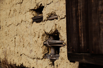 Broken clayey wall.The earth wall which was made with a Japanese tradition method of construction.