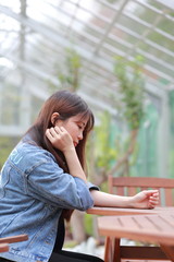 portrait of young woman at botanical garden in japan