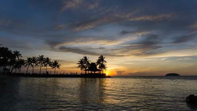 Day to night time lapse of sunset in Kota Kinabalu Tanjung Aru Beach in Sabah Malaysia