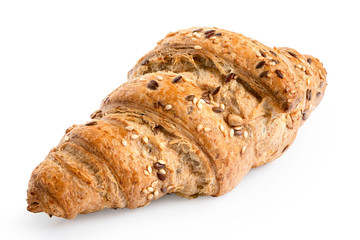 Whole wheat croissant with linseeds and sesame seeds isolated on white.