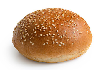 Sesame seed hamburger bun isolated on white.