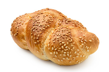 Plaited white bread roll with sesame seeds isolated on white.