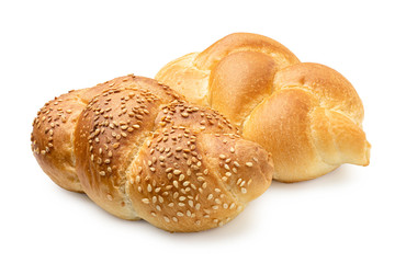 Two plaited white bread rolls isolated on white. Plain and with sesame seeds.