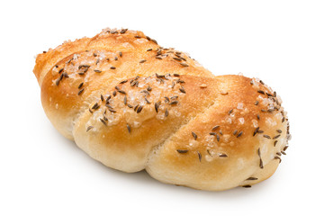 Plaited white bread roll with rough salt and caraway seeds isolated on white.
