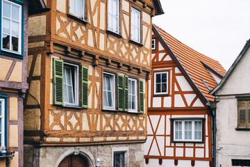 Exterior facade detail of ancient historic Fachwerkhäuser buildings in quaint village Marbach am...