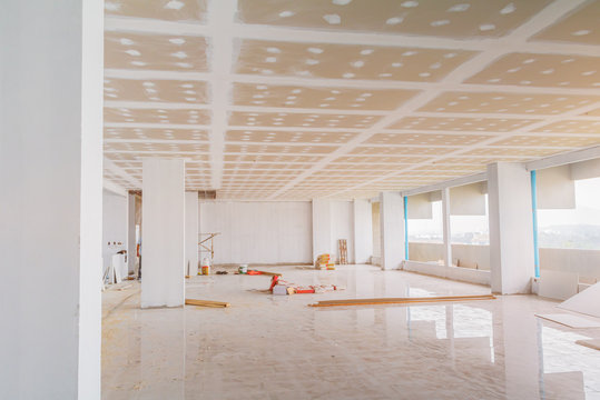 gypsum board ceiling structure and plaster mortar wall painted foundation white decorate interior room in building construction site