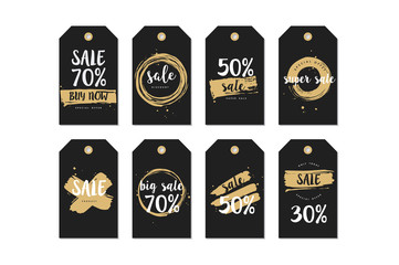 Vector illustration collection of sale discount styled brush strokes banners. Golden color. Stickers set.