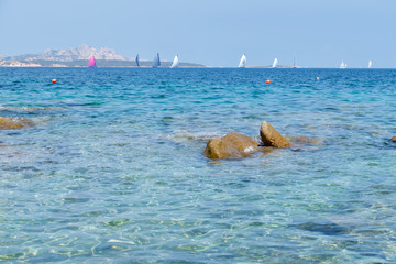 Fototapeta premium Idyllic beach in The Baja Sardinia, Sardinia Island, Italy. Destinatio scenics.