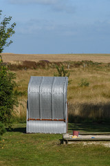 Obraz premium Strandkorb con Hinten vor Wiese auf Amrum 