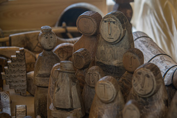 wood figurines. human, exhibition, wood carving. The faces of people carved from wood. wooden crafts
