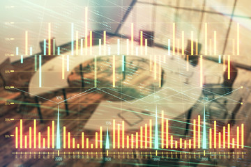 Multi exposure of stock market graph on conference room background. Concept of financial analysis