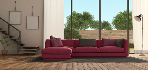 Obraz premium Modern living room with purple sofa and staircase