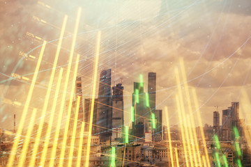 Fototapeta premium Double exposure of financial graph on downtown veiw background. Concept of stock market research and analysis