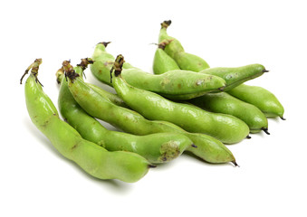 Broad beans on white background