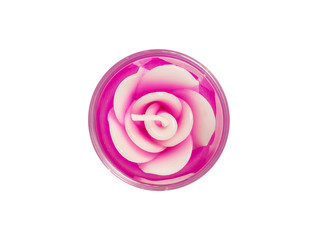 Closeup top view of candle in rose shape isolated on white background