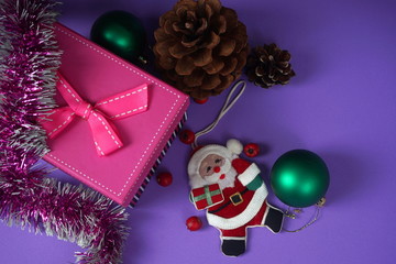 Christmas decorations for Christmas tree, gift, cones, Holly berries. The concept of celebrating...