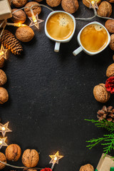 coffee, New Year, Christmas background or Noel holiday festive (nuts, cones, specials, decorations and gifts on the table, greeting card) winter menu concept. food background. copy space. Top view