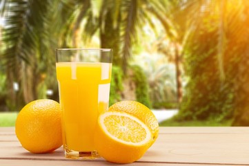 Orange juice and slices of orange on background © BillionPhotos.com
