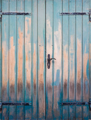 Vintage door. A closed up details of a wooden vintage door. texture and background.