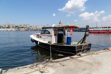 Fototapeta na wymiar ISTANBUL, TURKEY - jun. 23: Fisherman boat in the harbor of Istambul on jun, 23, 2019 in Istanbul, Turkey.