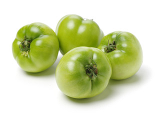fresh green tomato isolated on white background