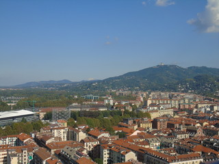 Fototapeta na wymiar Turin, Italy - 10/02/2019: Travelling around North Italy. Beautiful caption of Turin wih sunny days and blue sky. Panoramic view to the city from Mole Antoneliana. Detailed photography of the old arch