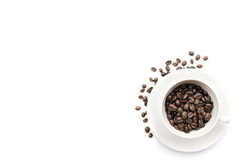Coffee beans in white coffee cup isolated on white table desk with workspace. Copy space empty blank for text.Time to drink.