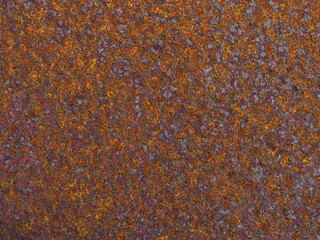 Rusty iron surface. Dark background or wallpaper. Macro