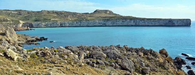 Mediterranean coastline and cliffs of Malta and Gozo.