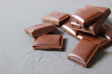 Pieces of chocolate on the table.