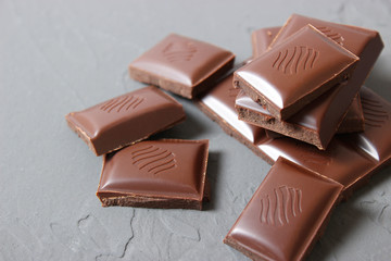 Pieces of chocolate on the table.