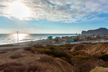 High view of the town and beach of San Lorenzo, Manabi, Ecuador, close to sunset.