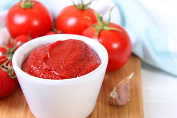 Tomato paste of fresh tomato on the table.