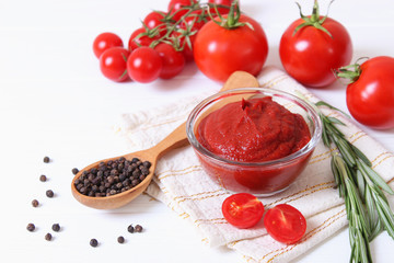 Tomato paste of fresh tomato on the table.