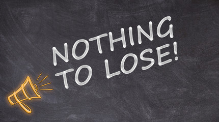 Obraz premium Nothing to lose written on blackboard with megaphone