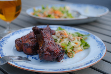 Thick ribs on a plate ready to be eaten