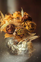 Handmade bouquet of autumn roses made from maple leaves