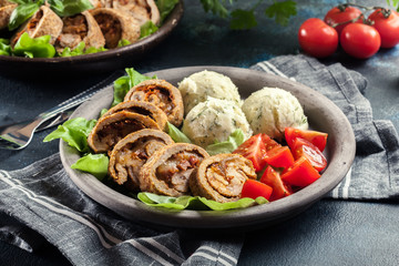 Pork rolls stuffed with mozzarella
