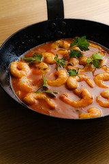 Shrimps in tomatoes sauce