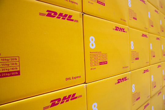 Sofia, Bulgaria - 17 October, 2018: Yellow DHL Express packages are seen arranged in a warehouse.