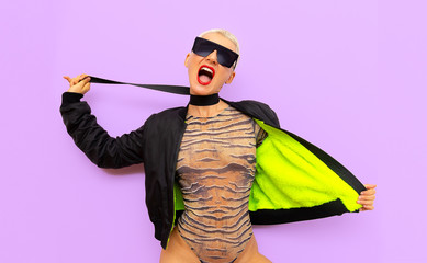 Freak blonde Girl in a fashionable body. Accent for animal print and clubbing party stuff