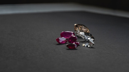 Collection of Red ruby and topaz, Precious stones for jewellery on black background