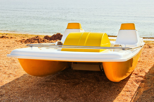 Catamaran on the seashore. Sea holiday