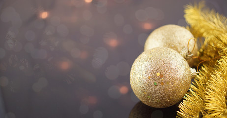 Christmas golden balls on bokeh background